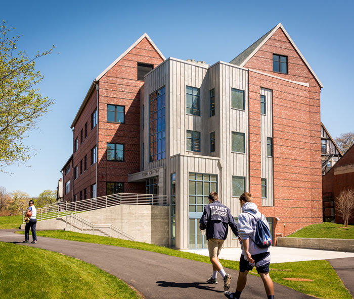 students walking on campus in a nice spring weather